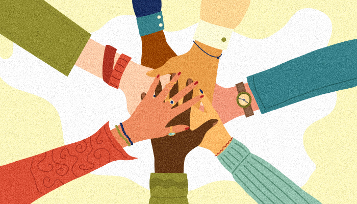 Graphic of diverse hands piled together
